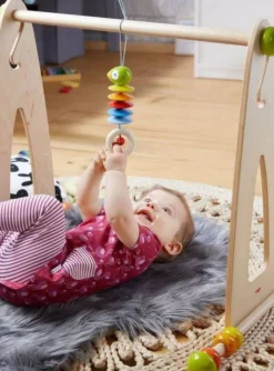 HABA Dangling Figure Parrot Stroller & Crib Toy< Hanging Baby Toys + Mobiles