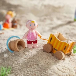 HABA Little Friends Baby Nora Doll With Wagon & Pail< Little Friends People